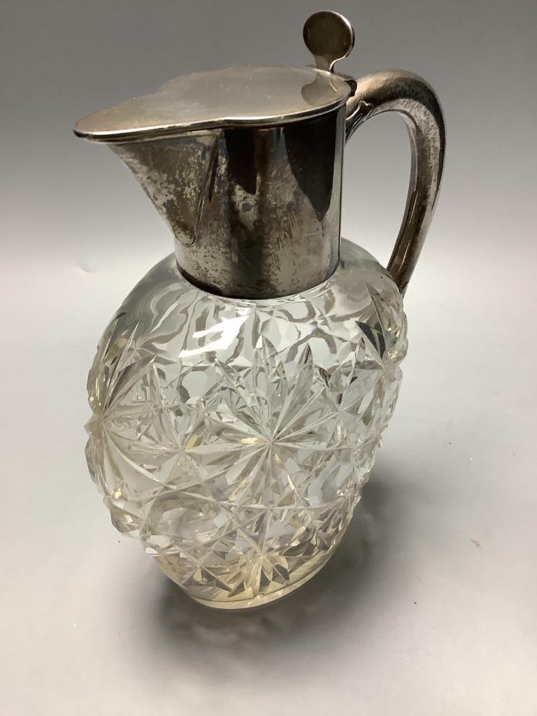 An Edwardian silver mounted cut class claret jug by Hamilton and Inches, Edinburgh 1902, height, 21.6 cm.